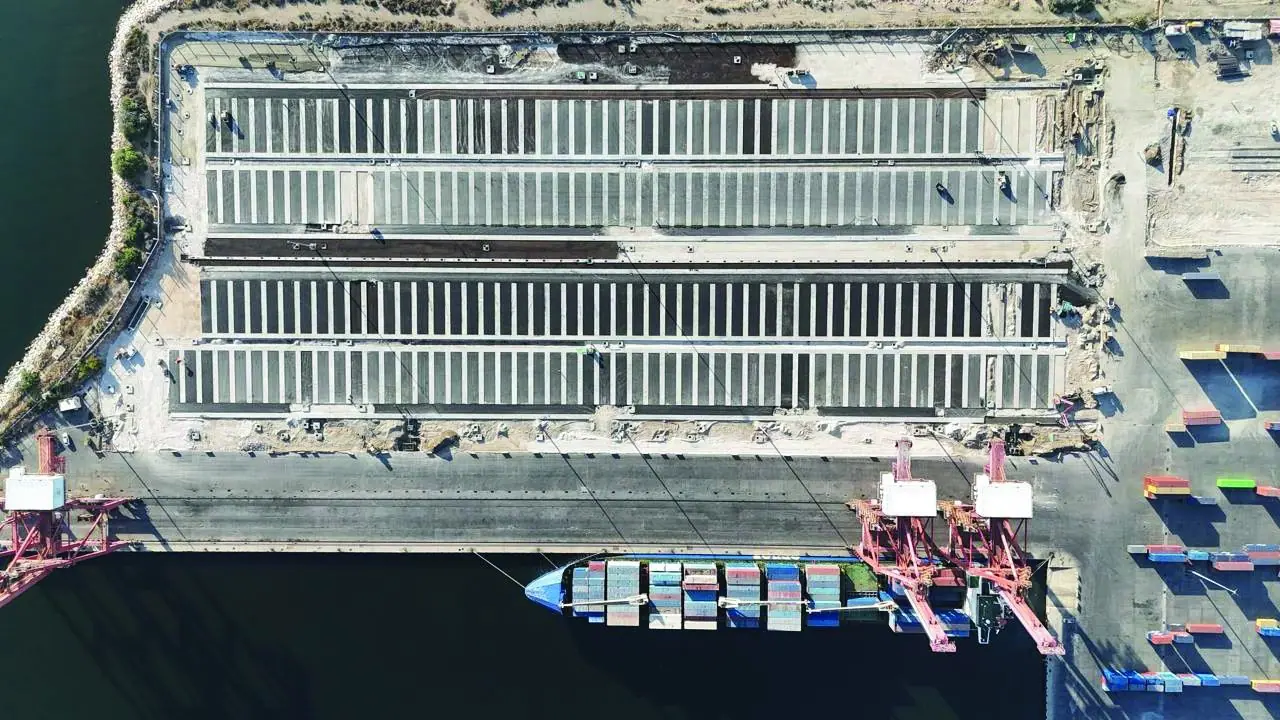 Terminal quay with vessel berthed alongside