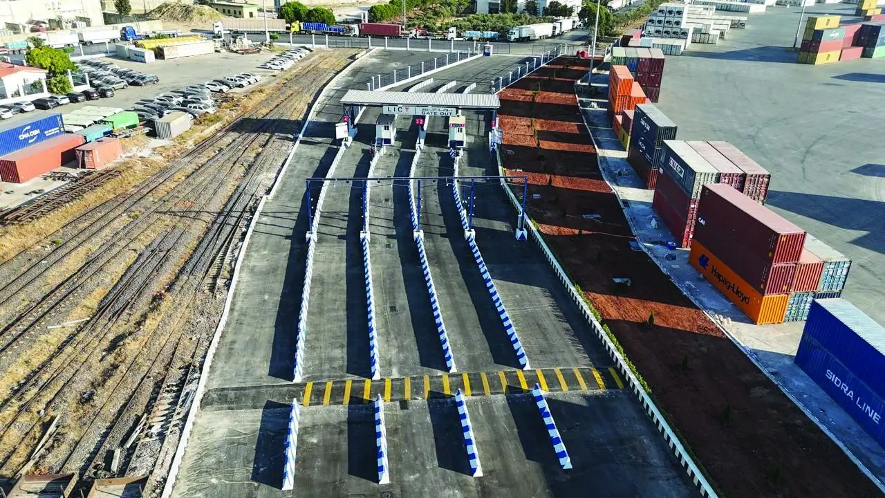 Container terminal apron with stacked containers and rail lines
