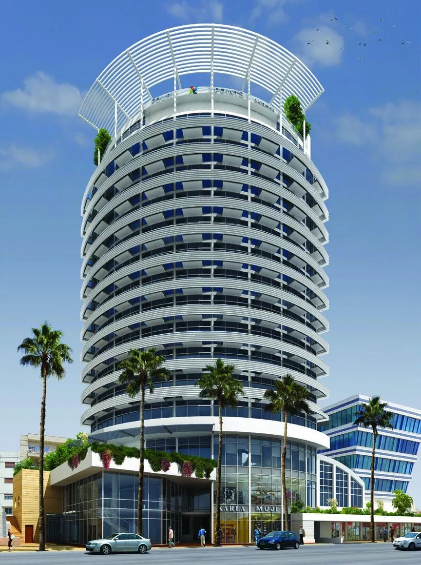 Hotel tower seen from street level among palms
